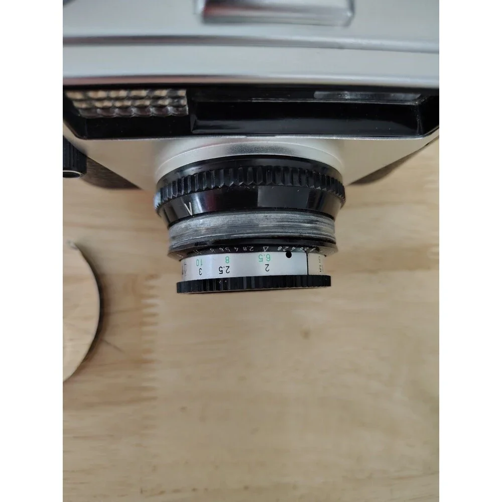 Regula Sprinty Camera with Rexar 45mm f/2.8 Lens and nice leather case read des